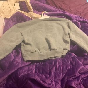 Grey long sleeved sweatshirt